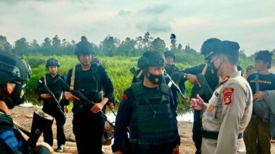 Eksekusi Lahan Di PT Mitra Aneka Rezeki, Brimob Polda Sumsel Lakukan Pengamanan