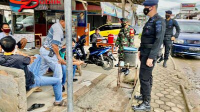 Berikan Jaminan Keamanan Bagi Masyarakat,  Personel Brimob Sumsel dan Koramil 404-03/Talang Ubi Laksanakan Patroli Bersama